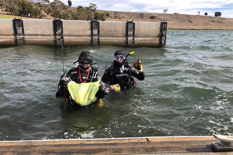 Steve Cooper and Sean Kevans collect rubbish from Lake Bullen Merri.jpg