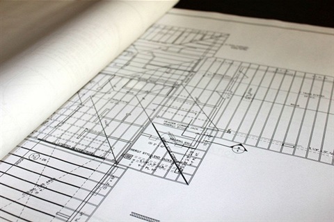 close-up-of-blueprint-on-construction-table.jpg